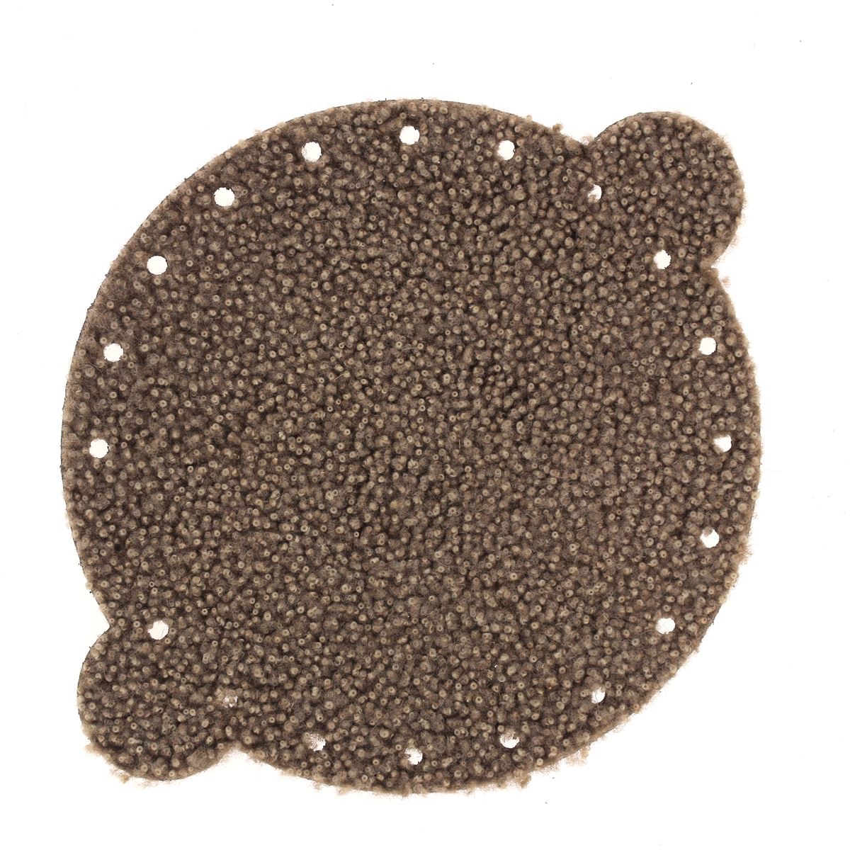 Découpe pour bourse en cuir lainé frisé de couleur marron, fabriquée par Deco Cuir, montrant la texture du cuir et la découpe.