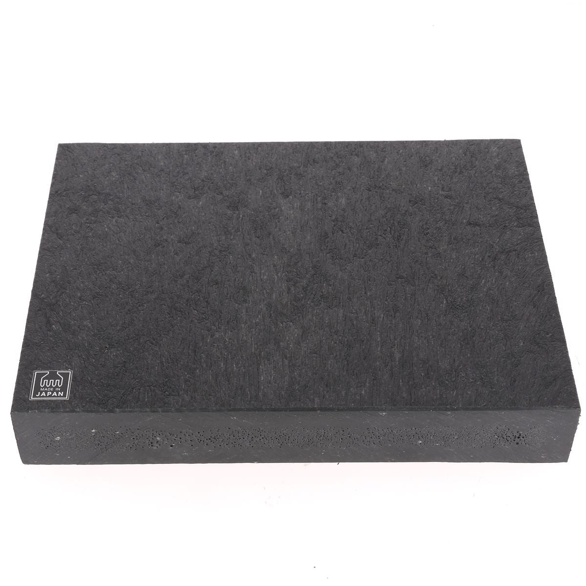 Plaque de découpe Oka pour outils, surface en acier robuste, idéale pour la cuisine ou le bricolage.