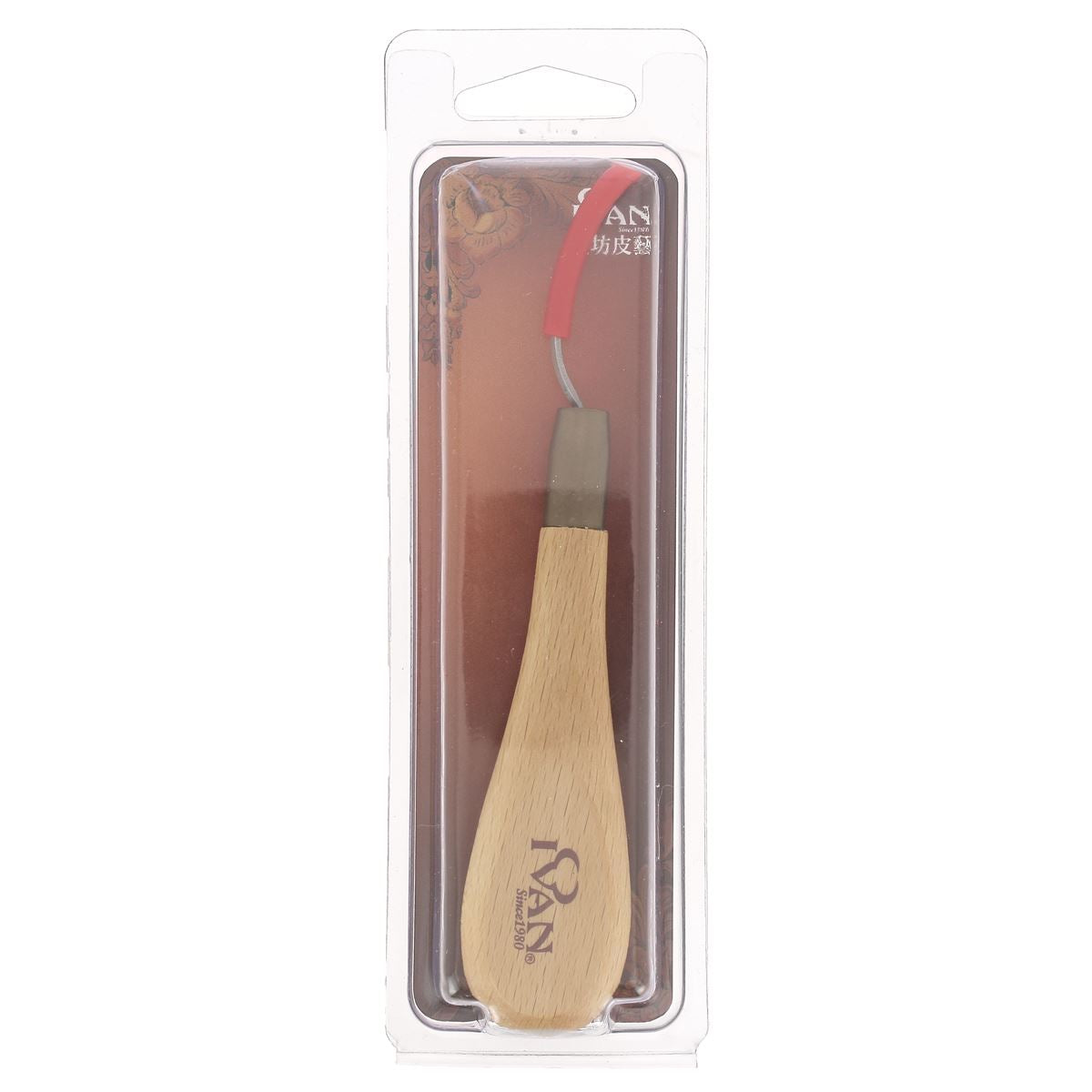 Aiguille de couture courbe Ivan 83020-01 pour cuir, outil de couture avec pointe fine et courbée, posé sur une surface en cuir.