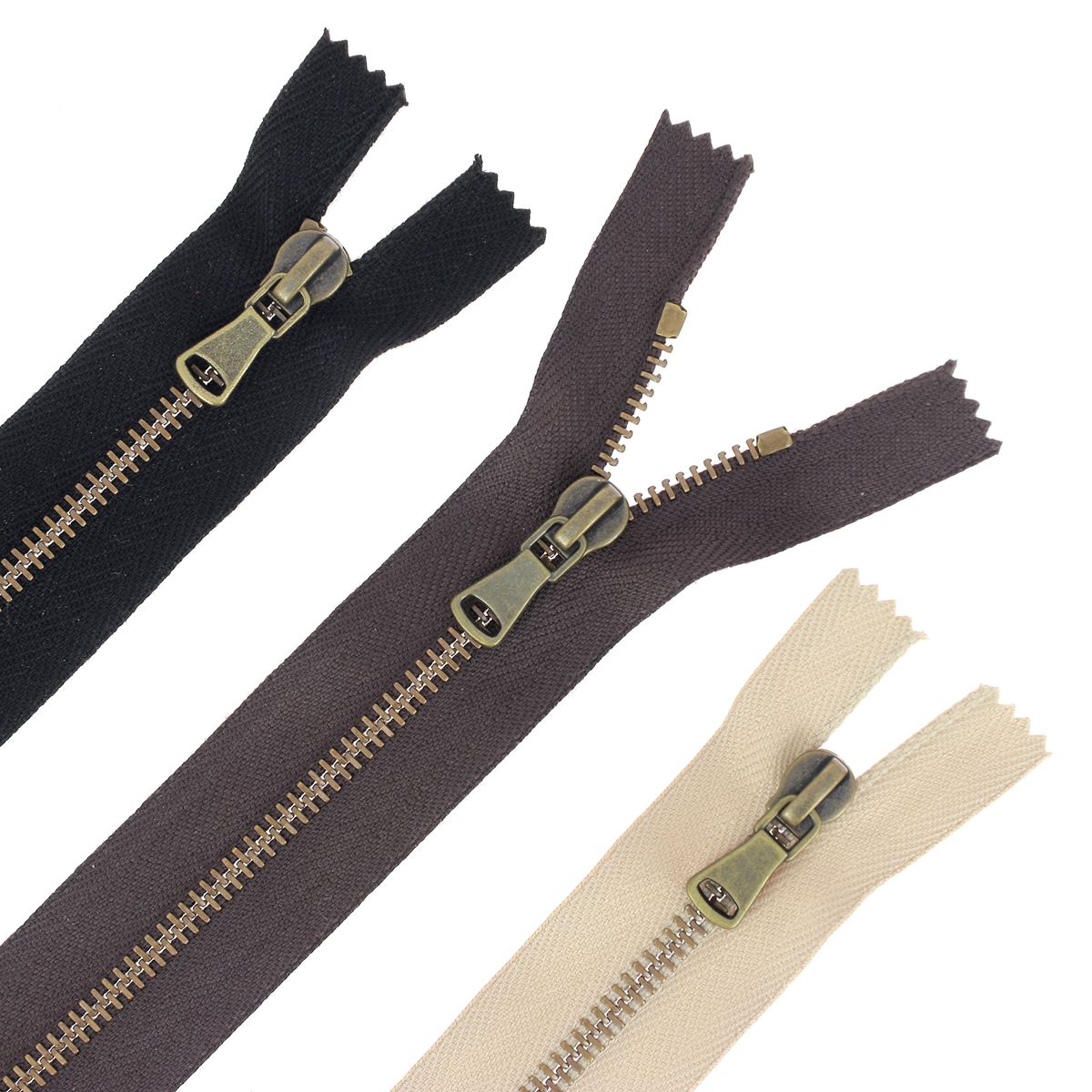Fermeture à glissière en métal 4mm SUPRA en laiton vieilli, accessoire de mercerie pour vêtements ou sacs.
