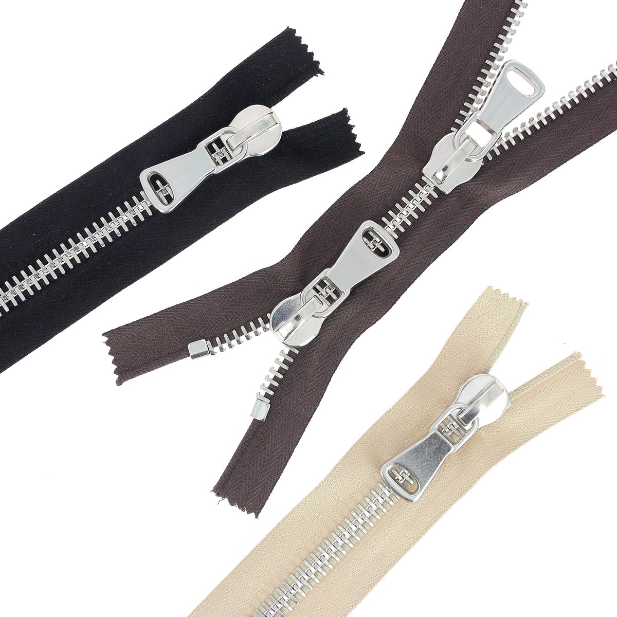 Fermeture à glissière double curseur en métal de 8mm, couleur nickelée, pour mercerie, marque SUPRA, visible en détail.