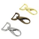 Mousqueton tournant ovale en bouclerie, attache demi-ronde, finition métal, utilisé pour la fixation sécurisée.