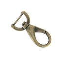 Mousqueton tournant ovale en bouclerie, attache demi-ronde en métal, avec boucle tournante pour fixation sécurisée.