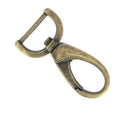 Mousqueton tournant ovale en bouclerie, attache demi-ronde, finition métallique, utilisé pour la fixation et la sécurité.