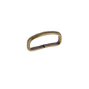Passant de ceinture en acier pour ceinture en cuir, finition métallique, design simple et durable.
