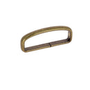 Passant de ceinture en acier de type passant de ceinture, vue rapprochée sur la boucle et la finition métallique.