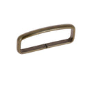 Passant de ceinture en acier pour ceinture, finition métallique, image montrant la pièce vue de face.