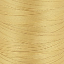 Bobine de fil polyester GRAL N°30 Ambre, 1000m, marque Coats, mercerie, vue détaillée du fil sur la bobine.