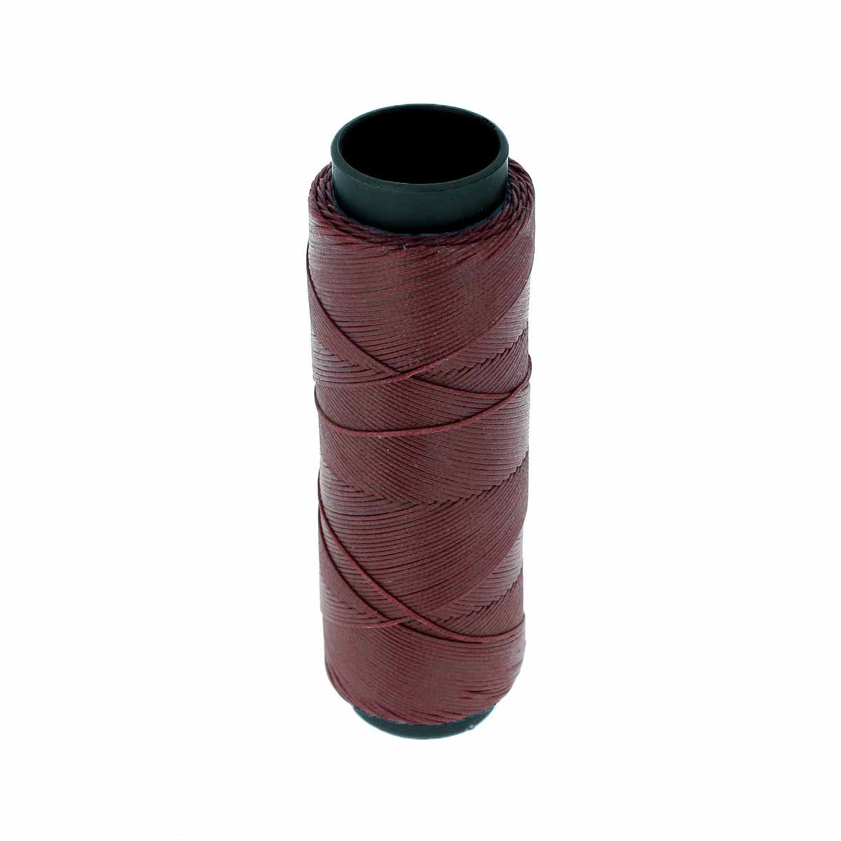 Bobine de 100m de fil polyester tressé et ciré, diamètre 0,6mm, en couleur bordeaux pour travaux de mercerie.