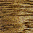 Fil de couture en polyester ciré couleur moka métallisé, M080 de la marque MeiSi. Fil ciré et métallisé pour apporter éclat à vos coutures