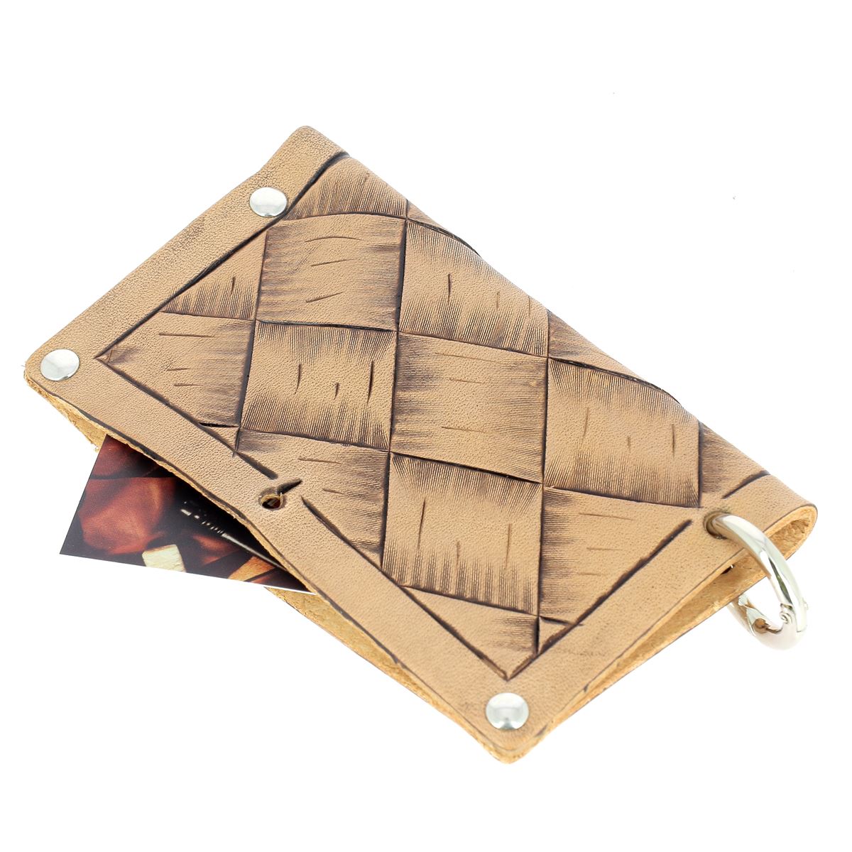 Formation repoussage du cuir pour débutants de Deco Cuir, image montrant des outils et techniques de cuir repoussé.