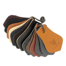 Échantillons de cuir Radermecker, nuancier avec 13 échantillons de différentes textures et couleurs de cuir.