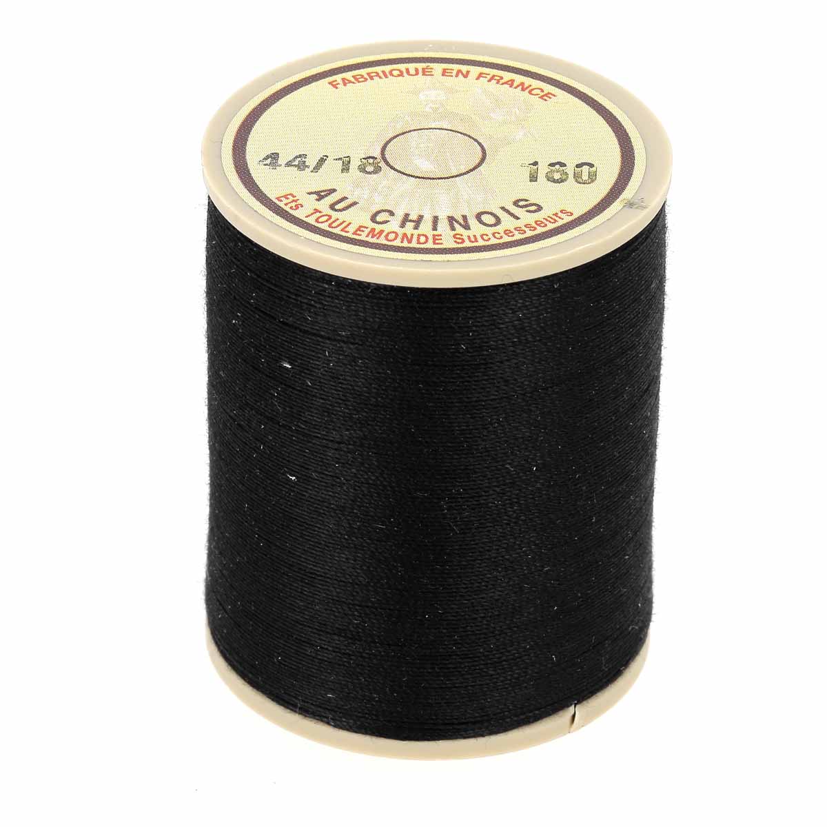 Bobine de 750m de fil cordonnet noir en polyester de la marque Fil au Chinois, idéal pour la mercerie et la couture.