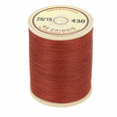 Bobine de 750m de fil cordonnet 100 % polyester "AU CHINOIS" pour mercerie, diamètre 0,63mm, enroulée sur une rouleau.