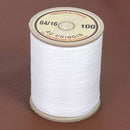 Bobine de 750m de fil cordonnet 100% polyester blanc de la marque Fil au Chinois, idéal pour couture et mercerie.