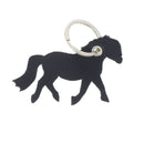 Découpe de cuir en forme de poney pour porte-clés, noire, de la marque Deco Cuir, illustration de la découpe artisanale.