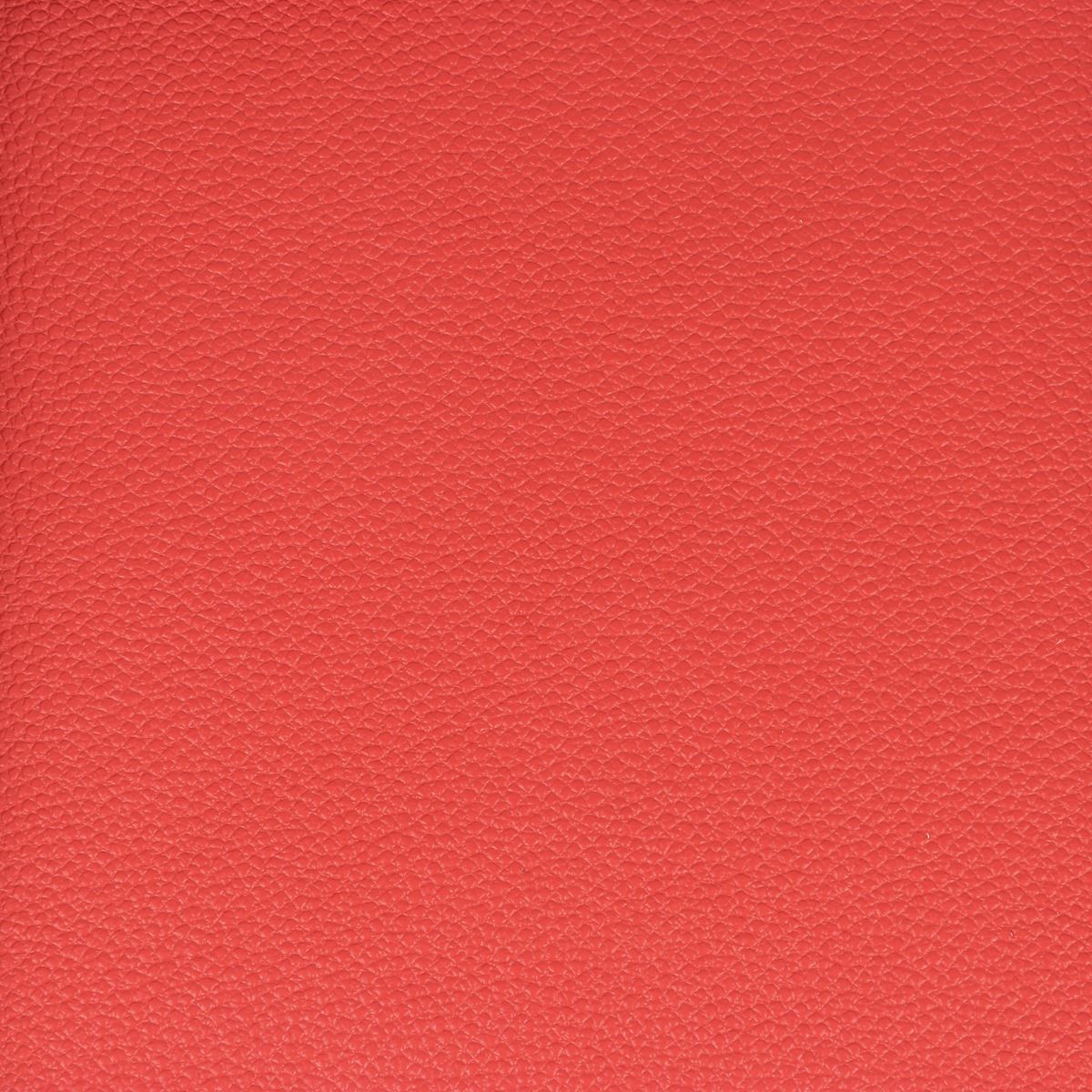 Peau de cuir de vachette grainé rouge, matériau noble pour créations en maroquinerie ou décoration.