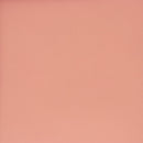 Peau de cuir de vachette lisse couleur rose pêche, durable et élégante, idéale pour la maroquinerie ou la couture.