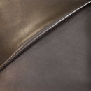 Peau de cuir de chèvre nappa couleur chocolat bronze, texture douce et souple, pour projets de maroquinerie ou décoration.