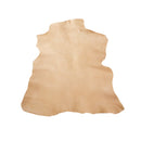 Peau de croûte de cuir de chèvre velours beige, forme rectangulaire, texture douce et mat, produit en cuir naturel.
