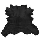 Peau entière de cuir de veau à poils couleur noir. Cuir à poils pour la fabrication de pochette, chaussure, coussins...