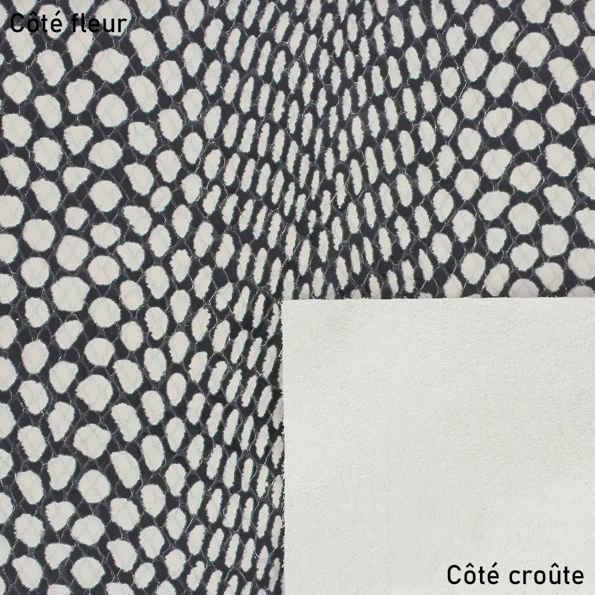 Cuir de veau noir et blanc imitation peau de serpent. Cuir effet peau de cobra idéal pour la réalisation de sac à main, pochette, porte-cartes, accessoire…