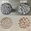 Matoir sur manche Oka avec texture matting roche de 10,5 mm, outil robuste pour travaux de maçonnerie ou façades.