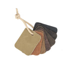 Échantillons de cuir de vachette pour ameublement, modèle CLUB, par Deco Cuir, montrant 7 nuances de cuir dans un pack.