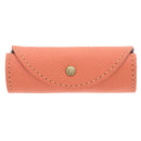 Gant de lustrage en cuir et fourrure pour l'entretien du cuir, de couleur rose, idéal pour polir et protéger les surfaces en cuir.