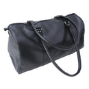 Kit DIY Deco Cuir pour sac de voyage en cuir noir, comprenant matériaux et instructions pour créer un sac personnalisé.