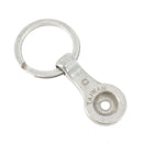 Porte-clé pour concho à visser en nickelé, conçu par Ivan, avec boucle en métal pour attacher facilement.