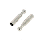 Deux embouts pour lacet rond de 4 mm en nickel, accessoires pour chaussures, image montrant les embouts métalliques.