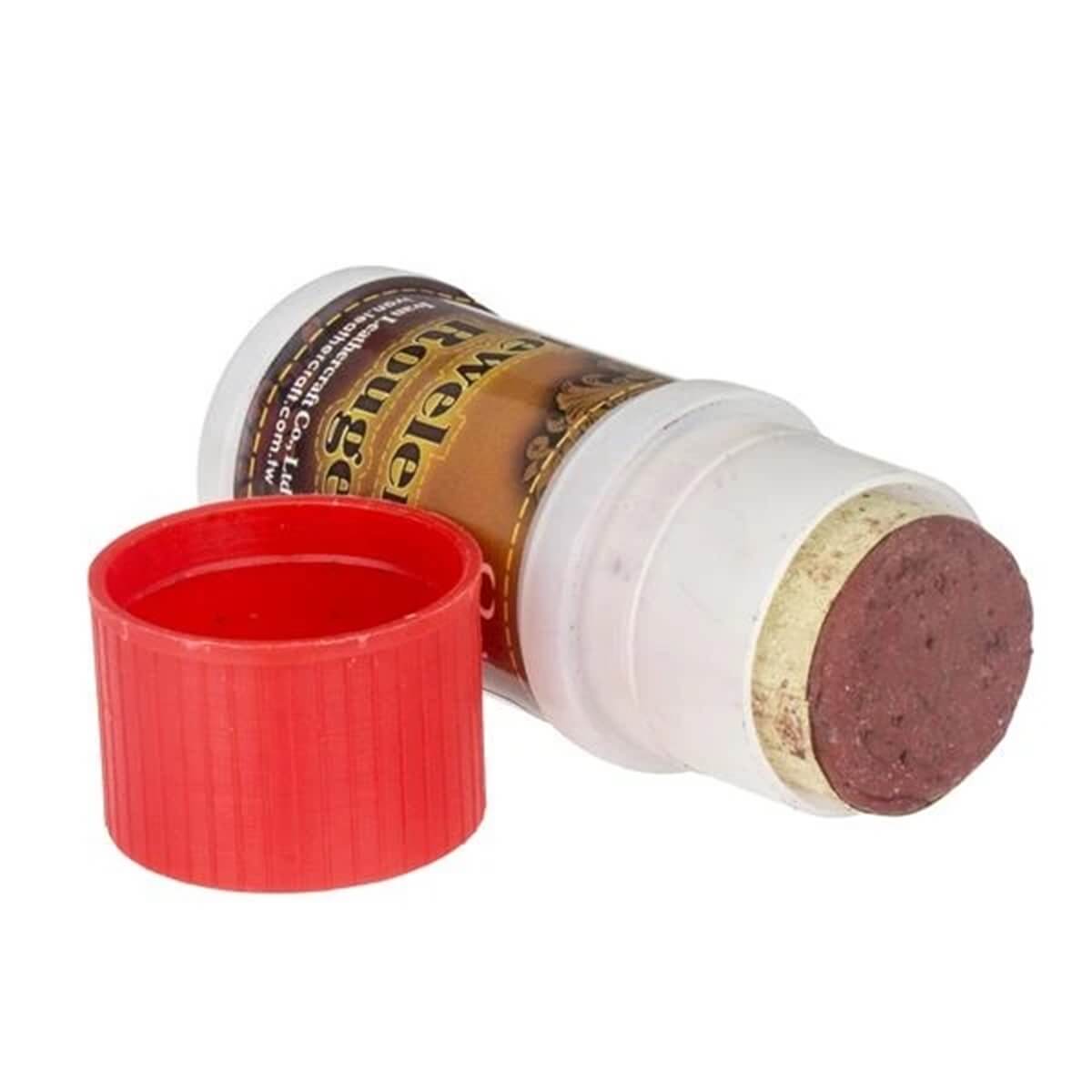 Outil Ivan bâtonnet de pâte à affûter au cuir pour aiguiser les lames, avec un manche en bois et une pâte abrasive.