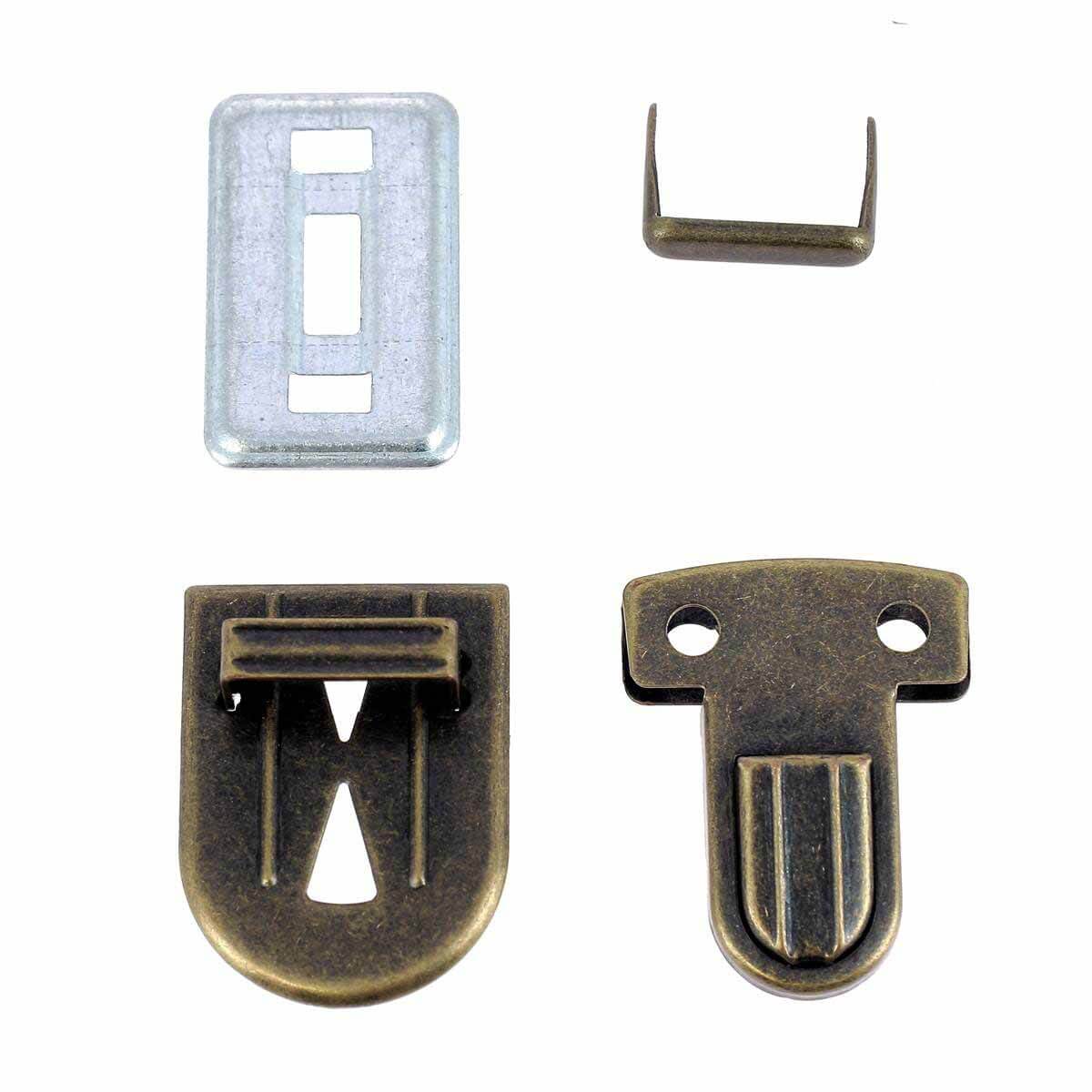 Fermeture de cartable TUCK Autres, 23x30mm, accessoire pour sac ou valise, en métal, visible sur l'image.