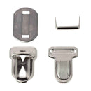Fermeture de cartable TUCK en nickel, 28x36 mm, accessoire pour sac ou cartable, image montrant la fermeture métallique.