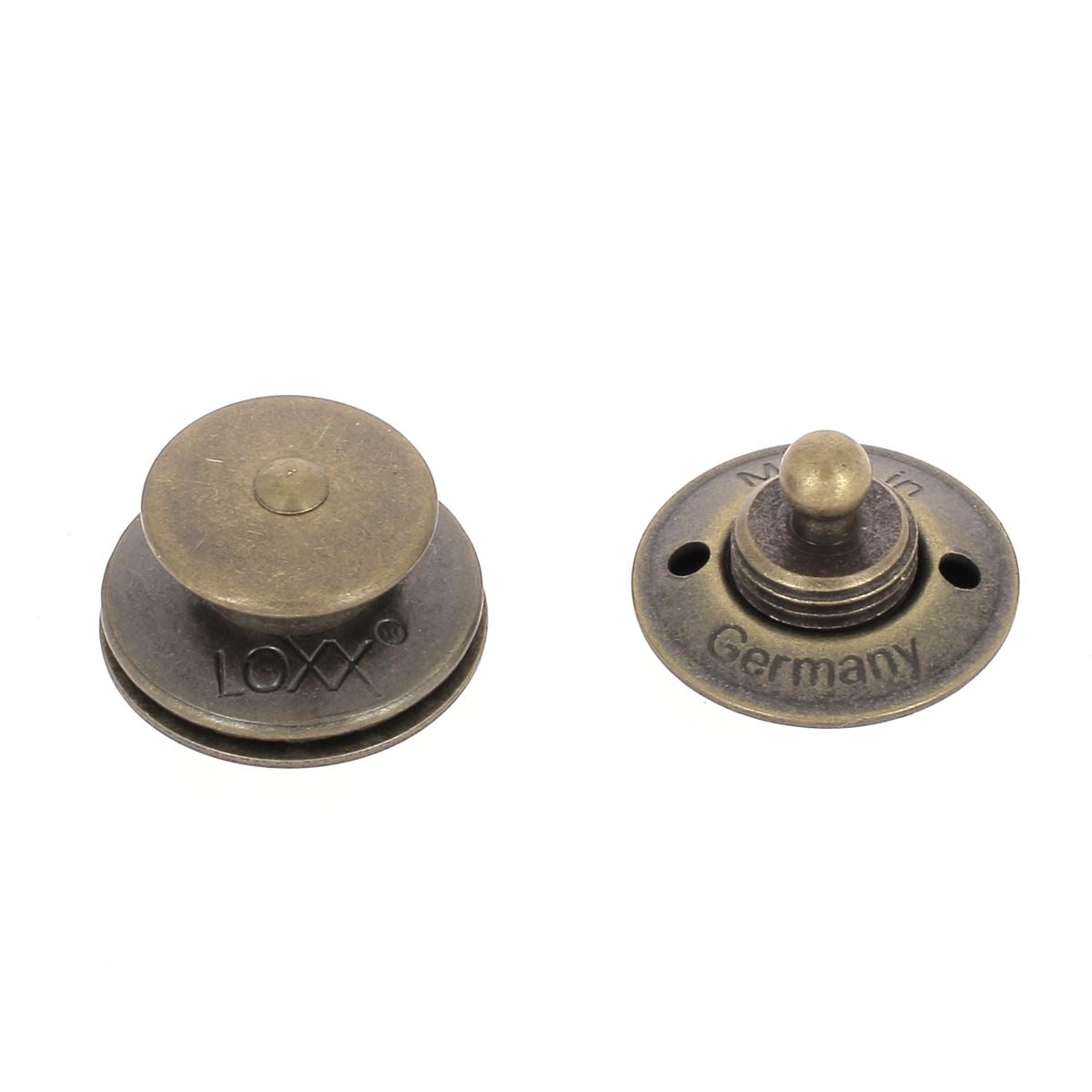 Fermeture autobloquante LOXX avec tête large et lisse en laiton vieilli, accessoire de fixation robuste et durable.