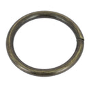 Anneau rond soudé en acier et laiton vieilli, pièce de bouclerie robuste et décorative, vue détaillée de l'anneau.