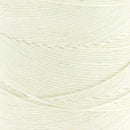 Bobine de fil de lin poissé naturel de la marque Campbell's, montrant la texture du fil enroulé sur la bobine.