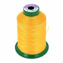 Bobine de fil polyester GRAL N°20 Coats, 600m, jaune, pour mercerie, visible avec étiquette et fil enroulé.