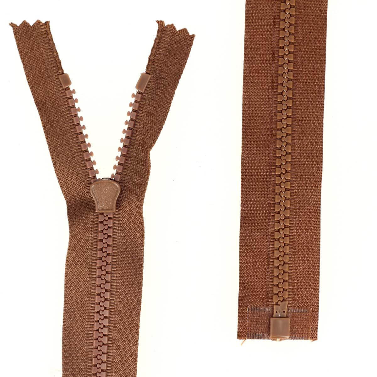 Fermeture à glissière séparable en plastique marron de 6 mm, boutonnière pour vêtements, vue rapprochée.