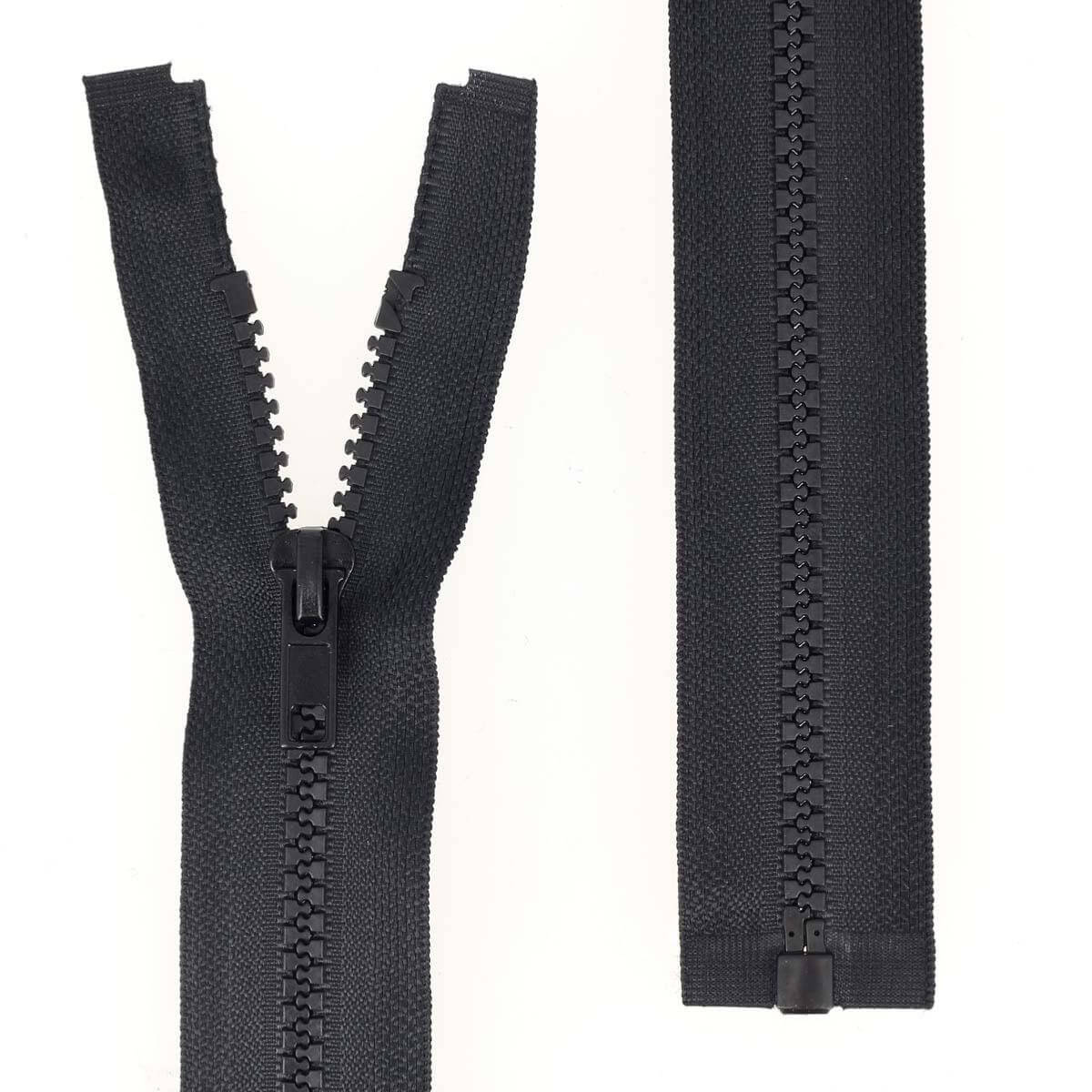 Fermeture à glissière séparable en plastique noir de 6 mm, mercerie Autres, vue rapprochée sur le curseur et la bande.