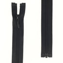 Fermeture à glissière séparable en nylon noir de 4 mm, produit de mercerie, avec curseur et dents visibles.