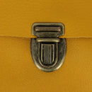 Fermeture de cartable TUCK en laiton vieilli, 21x30mm, accessoire pour sac ou cartable, visible en détail dans l'image.