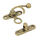 Fermoir pivotant en laiton vieilli pour sac, dimensions 36x42mm, accessoire de fixation robuste et élégant.