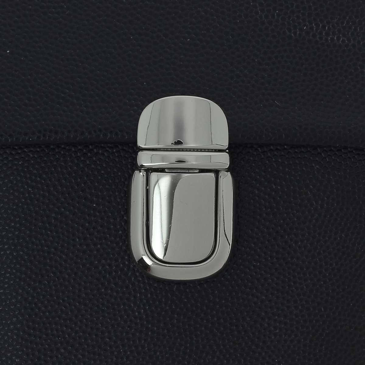 Fermeture de cartable TUCK de 20x36mm, accessoire en métal pour sacs et sacs à dos, vue rapprochée.