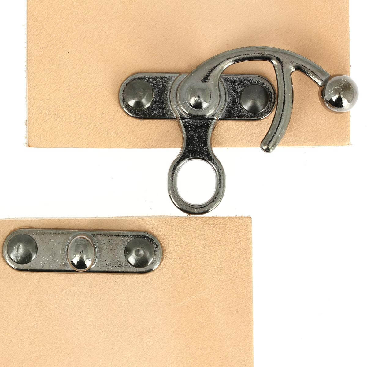 Fermoir pivotant pour sac de 36x42mm, accessoire en métal, avec mécanisme rotatif pour sacs et bagages.