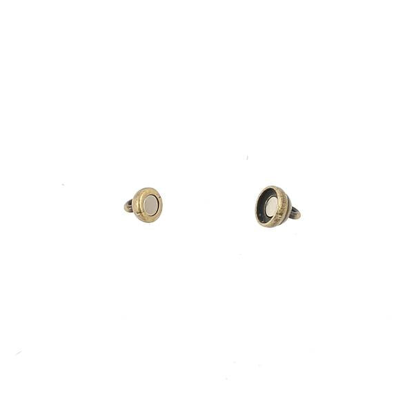 Fermoir bijou en boule aimantée pour lacet rond, création de bijoux, finition en métal, détail élégant et pratique.