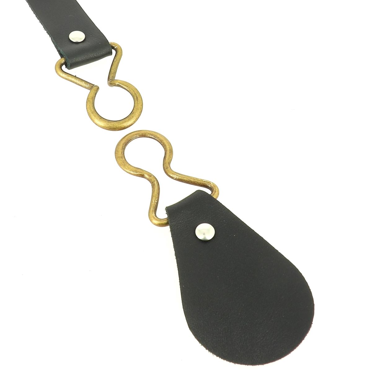 Boucle à entrelacer en nickel pour boucle de duffle-coat, vue rapprochée de la bouclerie en métal.