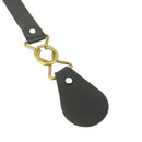 Boucle à entrelacer en métal nickel pour bouclerie de manteau, vue rapprochée sur finition et design élégant.