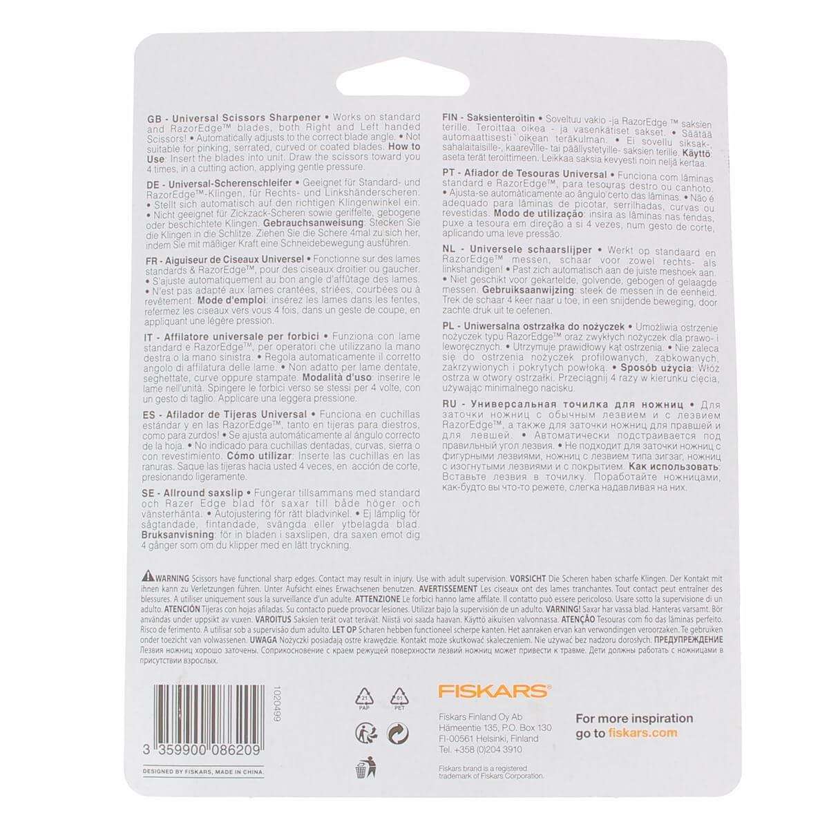Aiguiseur de ciseaux Fiskars universel pour affûter efficacement vos ciseaux, outil de qualité en gros plan.
